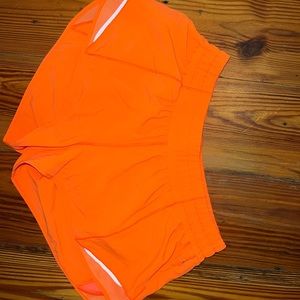 orange lululemon hotty hot shorts 2.5 in, size 8